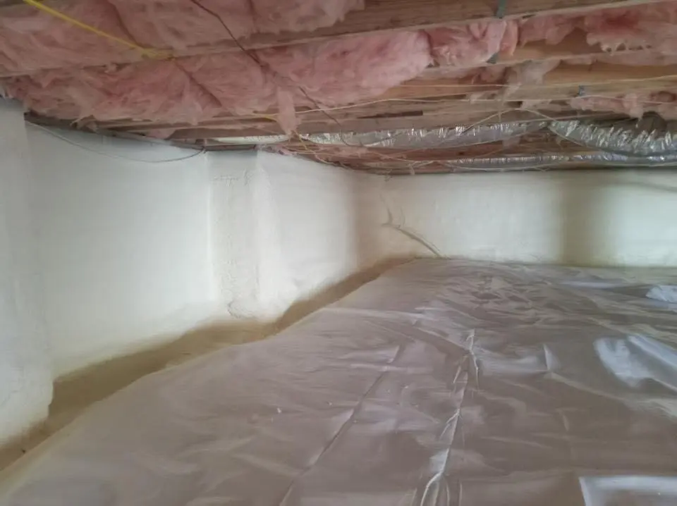 Crawl space encapsulation with closed-cell spray foam for Commercial Roof Restoration in Clarkson